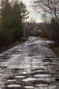 Dirt-road-with-potholes